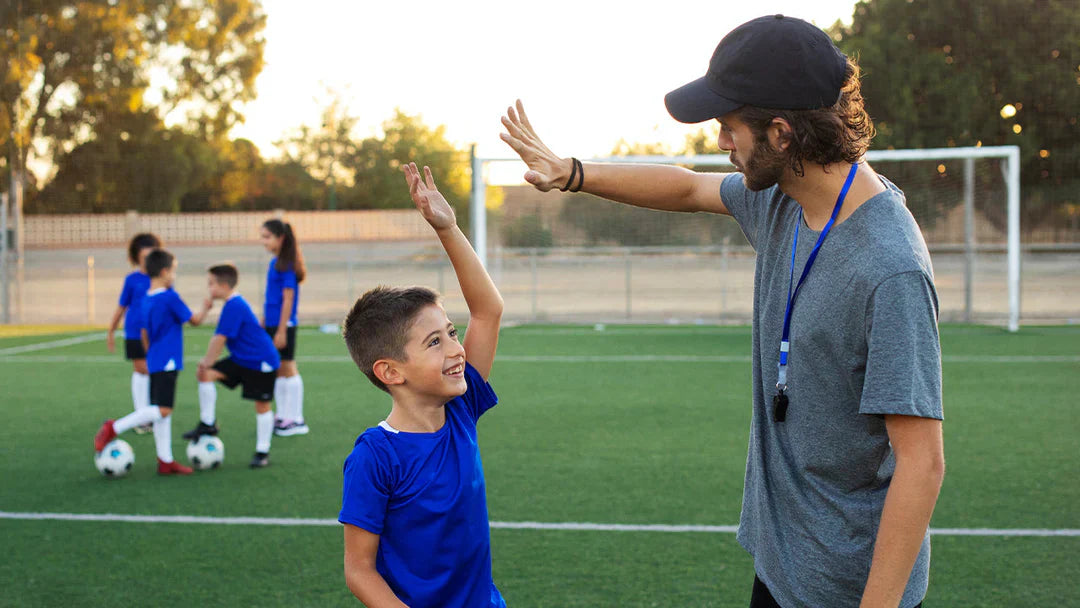 De mentale voordelen van voetbal voor kinderen en volwassenen